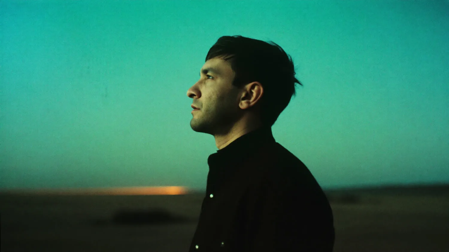 Muzamil Hasan looking toward the horizon